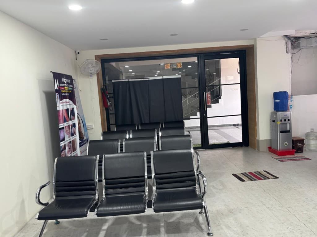 Main waiting hall with seating at Magenta Super Speciality Clinics